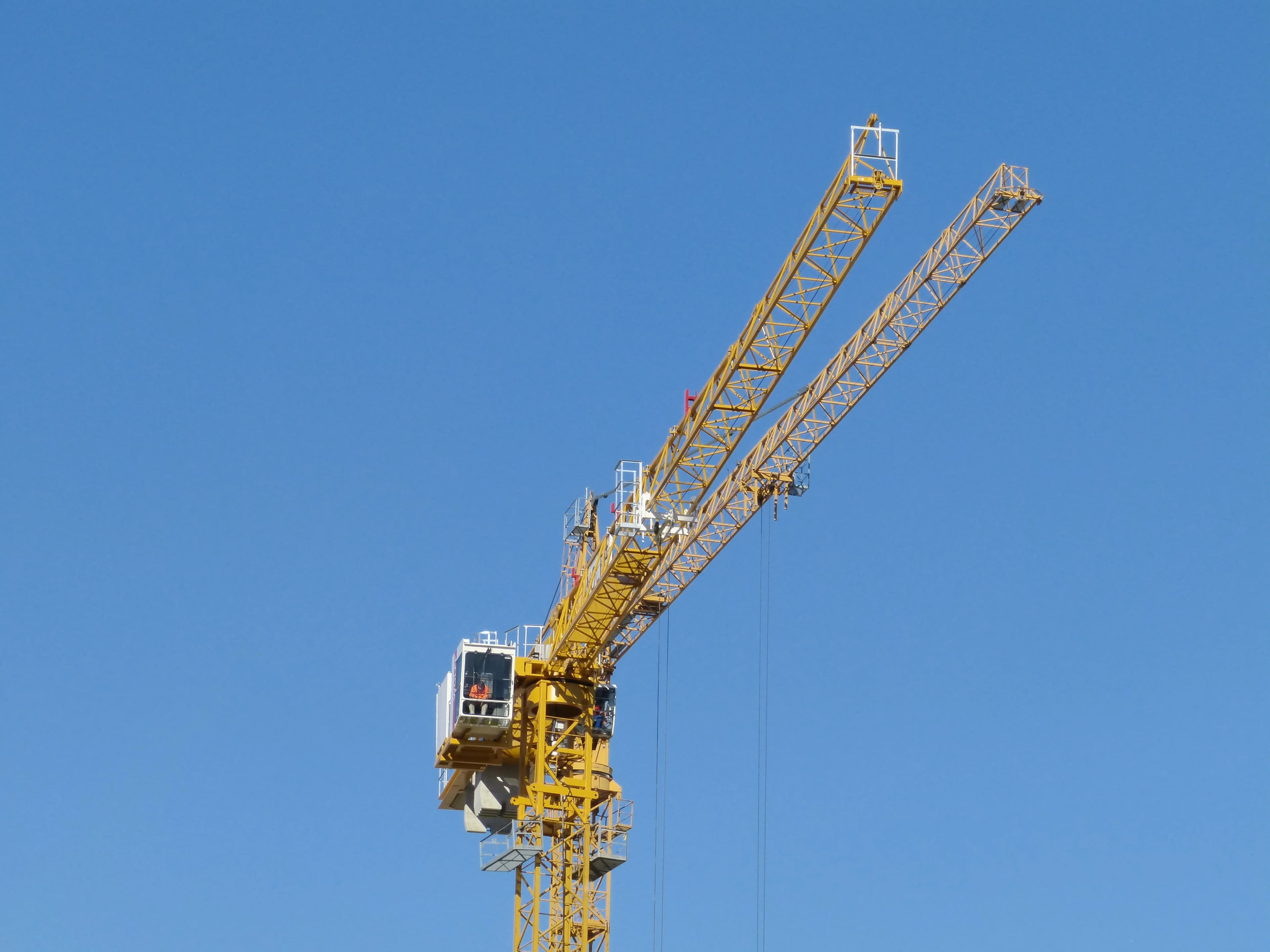 Overhead yellow gantry crane in C&C Marine fabrication bay